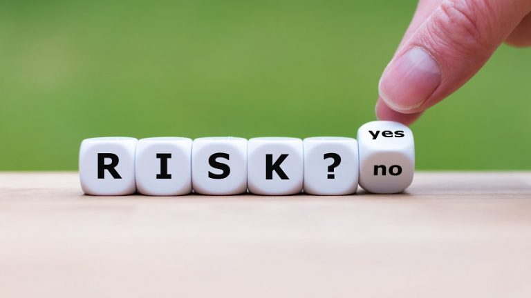 Take a risk? Hand turns a dice and changes the word "no" to "yes" (or vice versa).